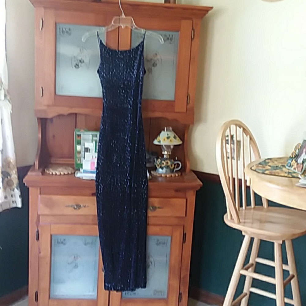 Evening gown blue with sparkles on it very dark bl
